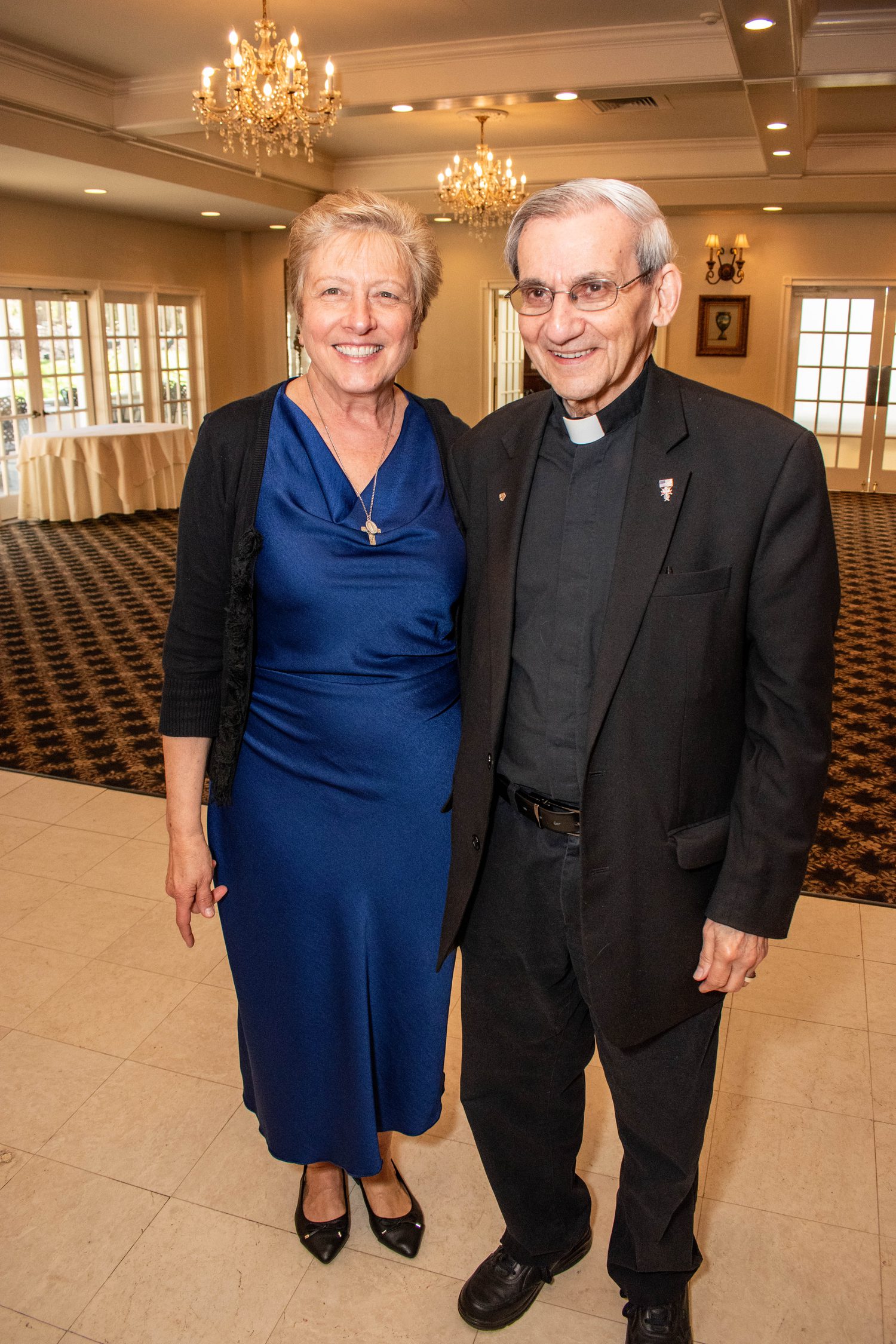 The center's director with Father Robert Rousseau, whose work inspired the center's founding
