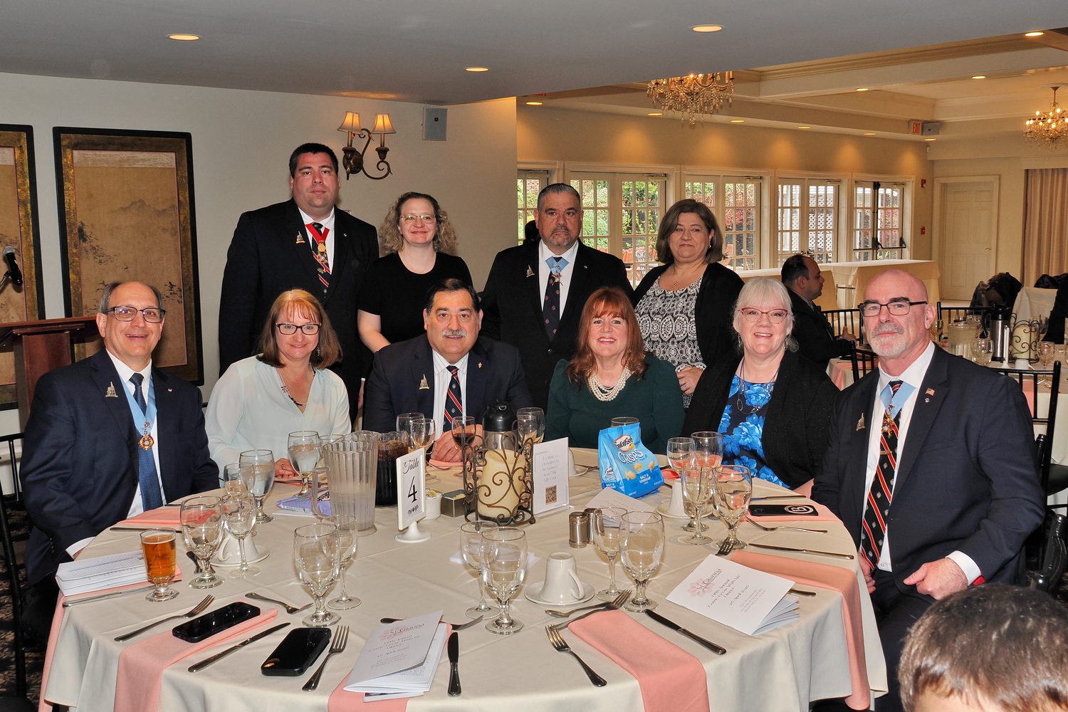 The honorees' table, with Knights of Columbus members in their regalia